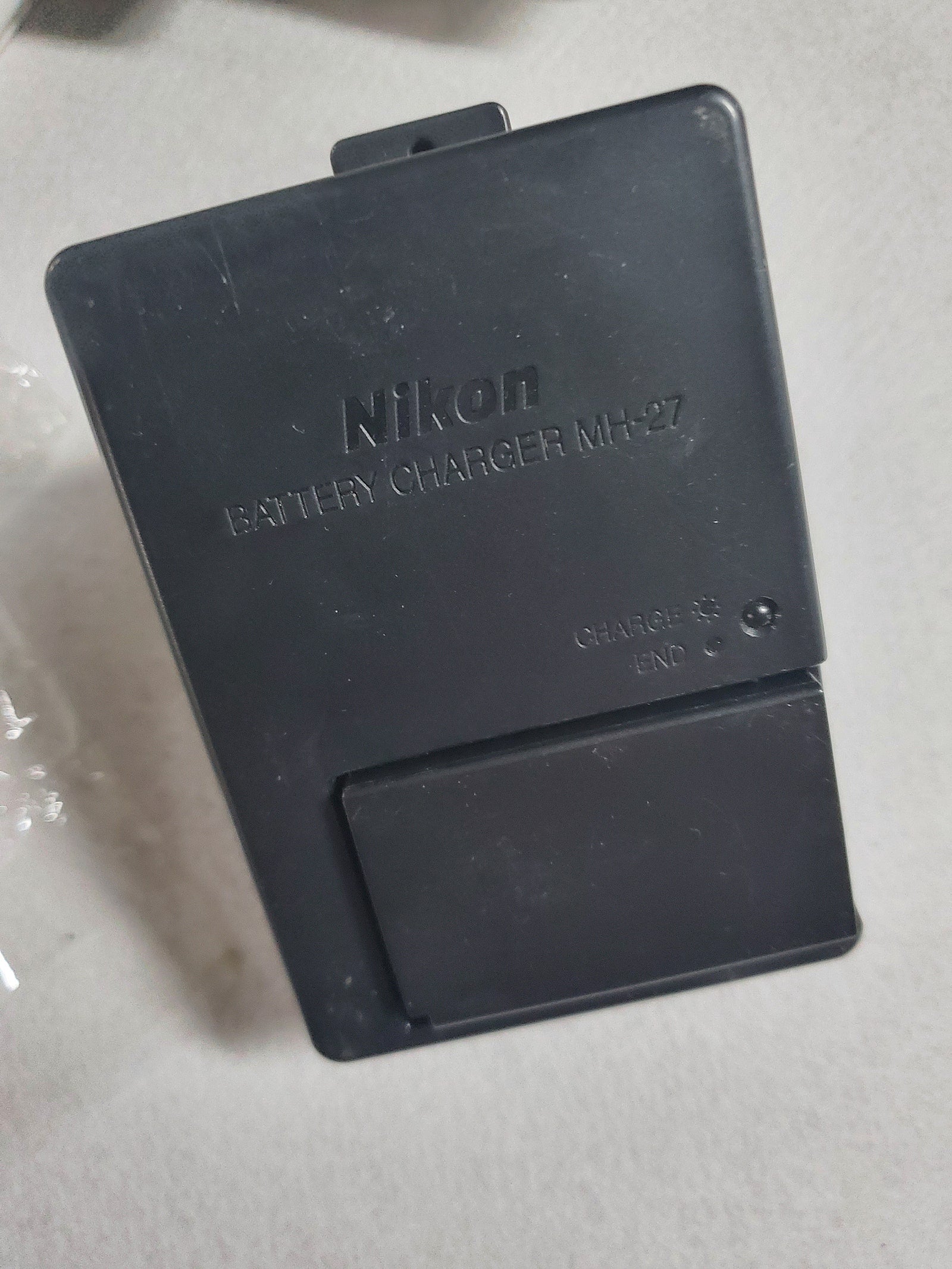 Nikon MH-27 charger (includes EN-EL20 battery).