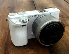 Sony Alpha A6000 Mirrorless Camera 16-50mm Power Zoom Lens Kit Wi-Fi NFC Black White Silver