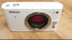 Nikon Mirrorless DSLR Nikon 1 J1 White N1 J1 Body only, No lens No battery