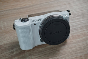Sony A5000 Compact Digital Camera White color Body with one battery (No Lens) USED